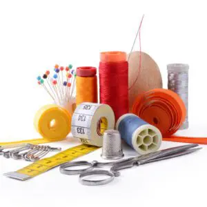 Sewing tools and colorful threads on display