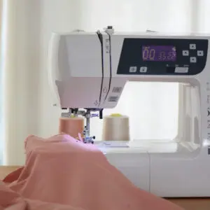 Sewing machine with pink fabric