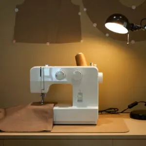 Crafting station with sewing machine and light