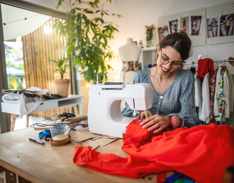 Woman sewing with a machine